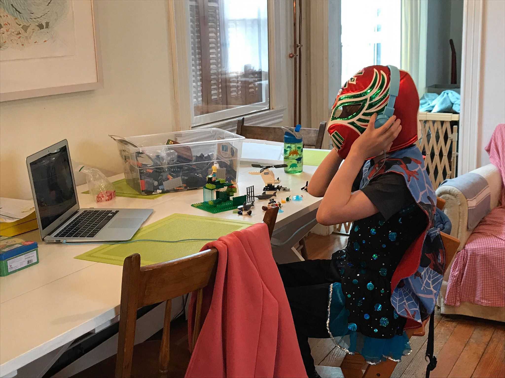 distance learning student with mask