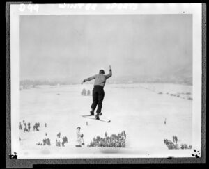 Person coming off a ski jump 