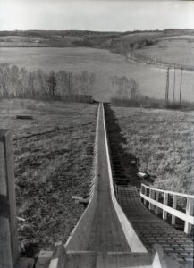 view down a steep toboggan slide in the area of Dexter, Maine