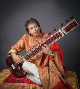 Ustad Safaat Khan plays a sitar 