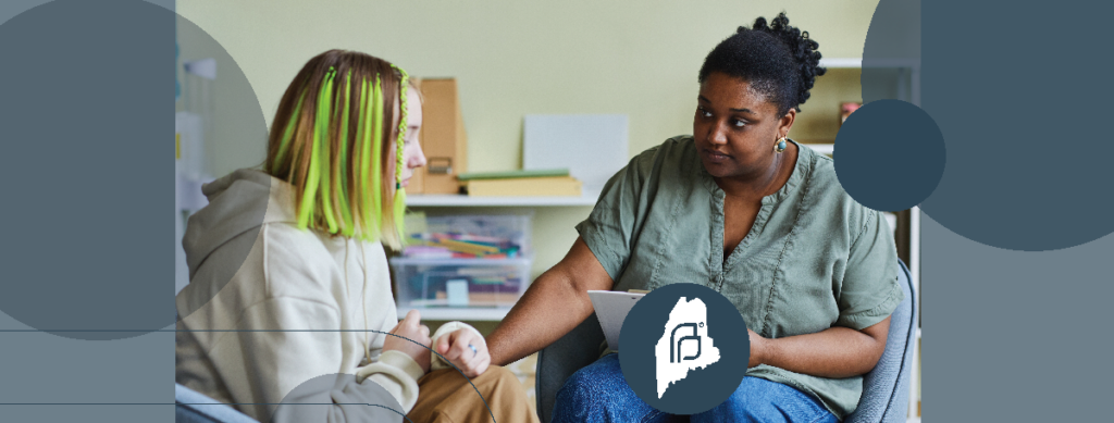 counselor listens intently to teen who is asking questions about reproductive health