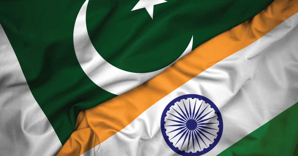 The flags of Pakistan and India sit next to each other