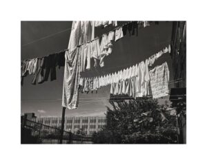 Black and white photo of clothes on a clothes line